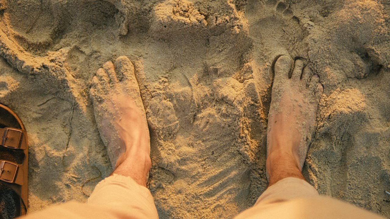 bare feet in sand